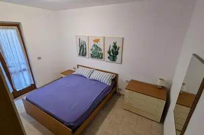 Letto o letti in una camera di L'accogliente Casa Ginepro
