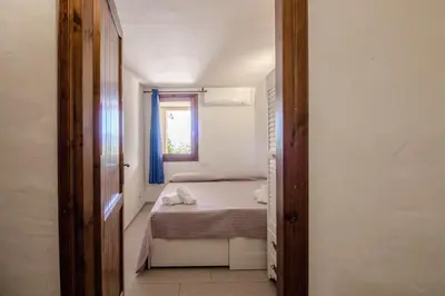 Letto o letti in una camera di GuestHost - Sea View Apartment with Veranda!