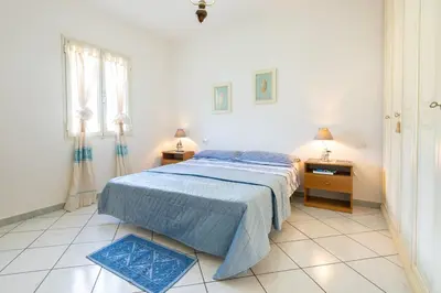 Letto o letti in una camera di Casa Rockefeller