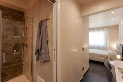 Letto o letti in una camera di B&B Il Glicine