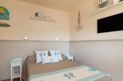 Letto o letti in una camera di Mishti Blu Studio al Mare by Wonderful Italy