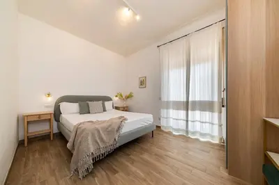 Letto o letti in una camera di NG Collection l'Acquedotto