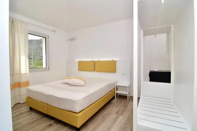 Letto o letti in una camera di Le Spiagge di San Teo