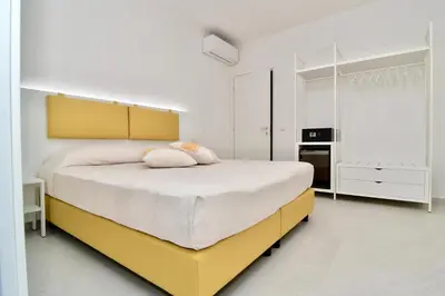 Letto o letti in una camera di Le Spiagge di San Teo
