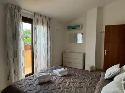 Letto o letti in una camera di Olbia Smeralda