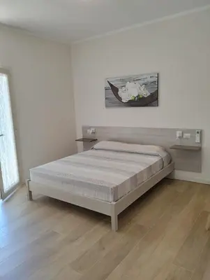 Letto o letti in una camera di Lilly's house
