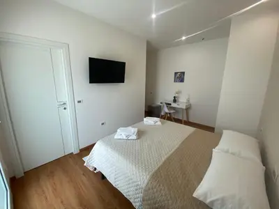 Letto o letti in una camera di Zulie Rooms