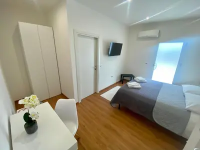 Letto o letti in una camera di Zulie Rooms