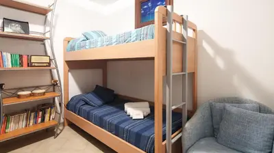 Letto o letti in una camera di Welcomely - Petali di Rosa - A Due Passi dalla Spiaggia