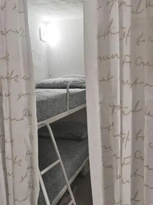 Letto o letti in una camera di Happy sun on the hill