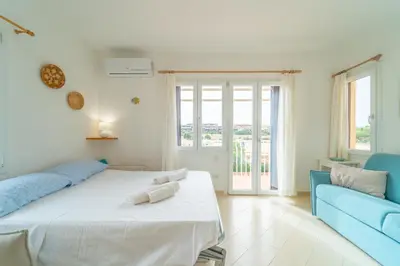 Letto o letti in una camera di Faretto by DomusAway