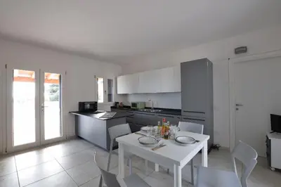 Cucina o angolo cottura di Villa Del Sole In Budoni Sea View