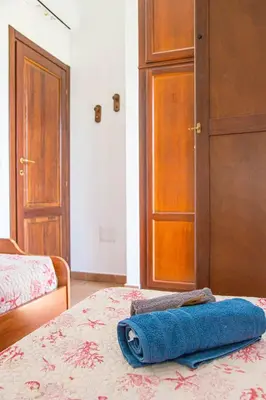 Letto o letti in una camera di Casa Anahita, 4 posti letto