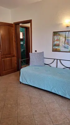 Letto o letti in una camera di Marana apartments with private beach
