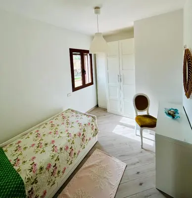 Letto o letti in una camera di Villa Ulivo