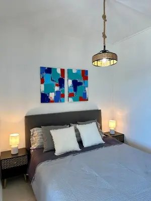 Letto o letti in una camera di Casa Corallo