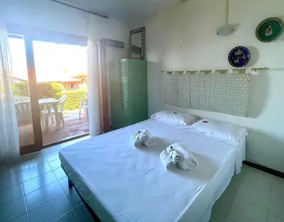 Letto o letti in una camera di PUNTA EST Monolocale Vista Mare