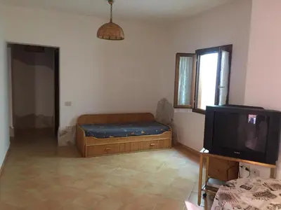Letto o letti in una camera di Appartamento Ampio e Comodo