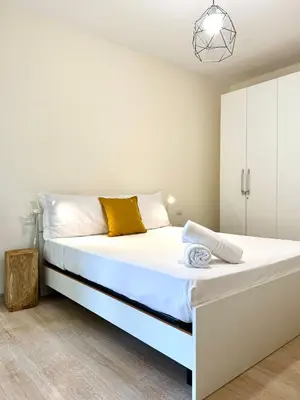 Letto o letti in una camera di Veneto Luxury Apartment