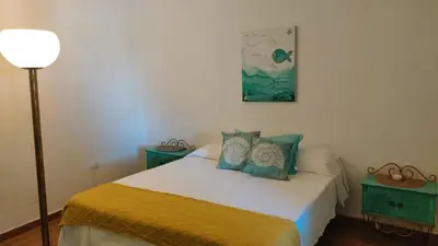 Letto o letti in una camera di Orosei Re - Rosa's House Centro Storico