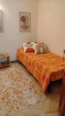 Letto o letti in una camera di Orosei Re - Rosa's House Centro Storico