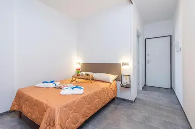 Letto o letti in una camera di Always Traveling Near The City Center - Happy Rentals