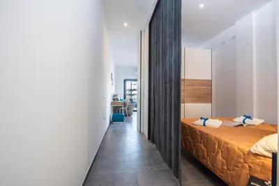 Letto o letti in una camera di Always Traveling Near The City Center - Happy Rentals