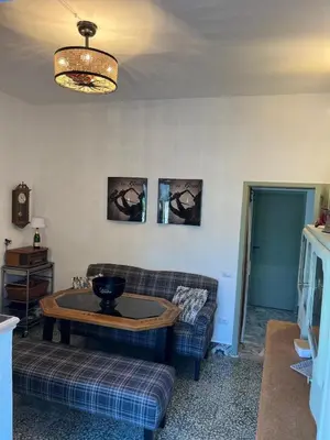 Area soggiorno di B&B San Gavino