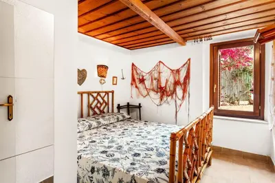 Letto o letti in una camera di 5 min from the sea - Jacuzzi Garden Parking Wifi