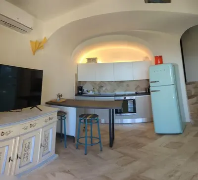 Cucina o angolo cottura di Supreme Beach Location with pool at Cala Sassari