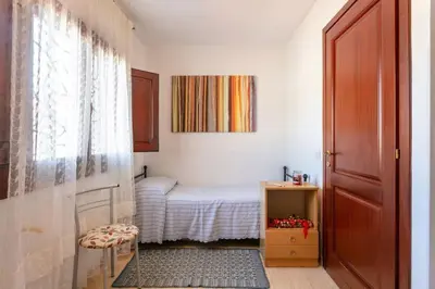Letto o letti in una camera di VILLA Piera SOS ARANZOS -Golfo Aranci Sea View-