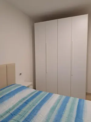 Letto o letti in una camera di Orosei Apart
