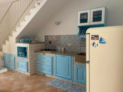 Cucina o angolo cottura di Villa Ginevra a Lu Fraili - San Teodoro