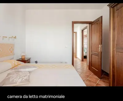 Letto o letti in una camera di Villetta VISTA MARE con parcheggio WIFI