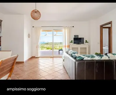 Letto o letti in una camera di Villetta VISTA MARE con parcheggio WIFI
