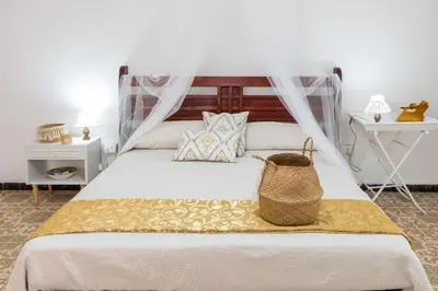 Letto o letti in una camera di Casa Babylon, Bohemian Getaway