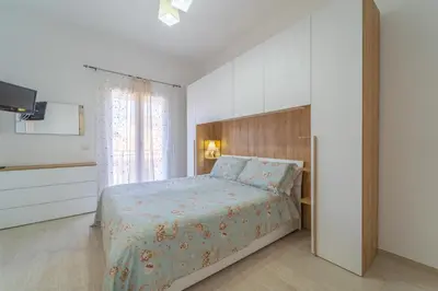 Letto o letti in una camera di Linfa Guest House - Olbia centro