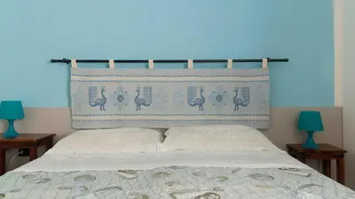 Letto o letti in una camera di Cala Gonone house