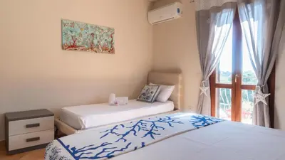 Letto o letti in una camera di Casa Stella Di Mare