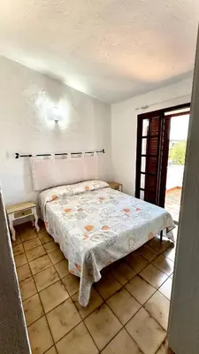 Letto o letti in una camera di Villa Franziscu