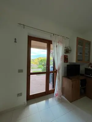 Cucina o angolo cottura di Villetta MP casa sviluppata su due piani con doppia veranda e parcheggio privato
