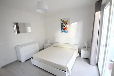 Letto o letti in una camera di Appartamento Valkiria