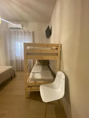 Letto o letti in una camera di DreamHouse B&B Olbia