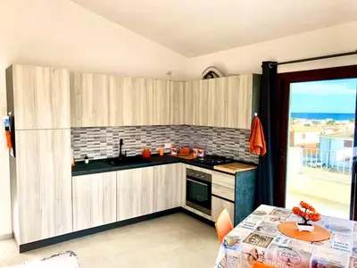 Cucina o angolo cottura di La perla sul mare della Caletta