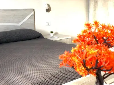 Letto o letti in una camera di La perla sul mare della Caletta