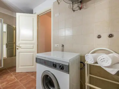 Letto o letti in una camera di Villa Billia Sardinia Domus