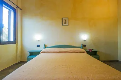 Letto o letti in una camera di Appartamento Gli Ontani