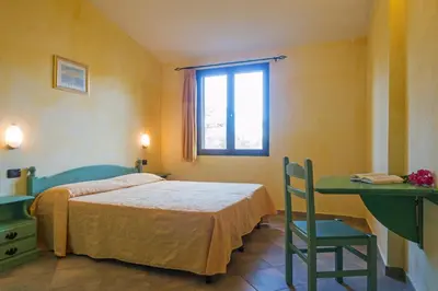 Letto o letti in una camera di Appartamento Gli Ontani