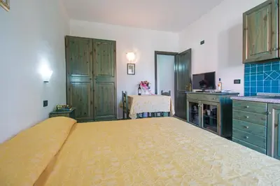 Cucina o angolo cottura di Appartamento Gli Ontani