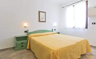 Letto o letti in una camera di Appartamento Gli Ontani
